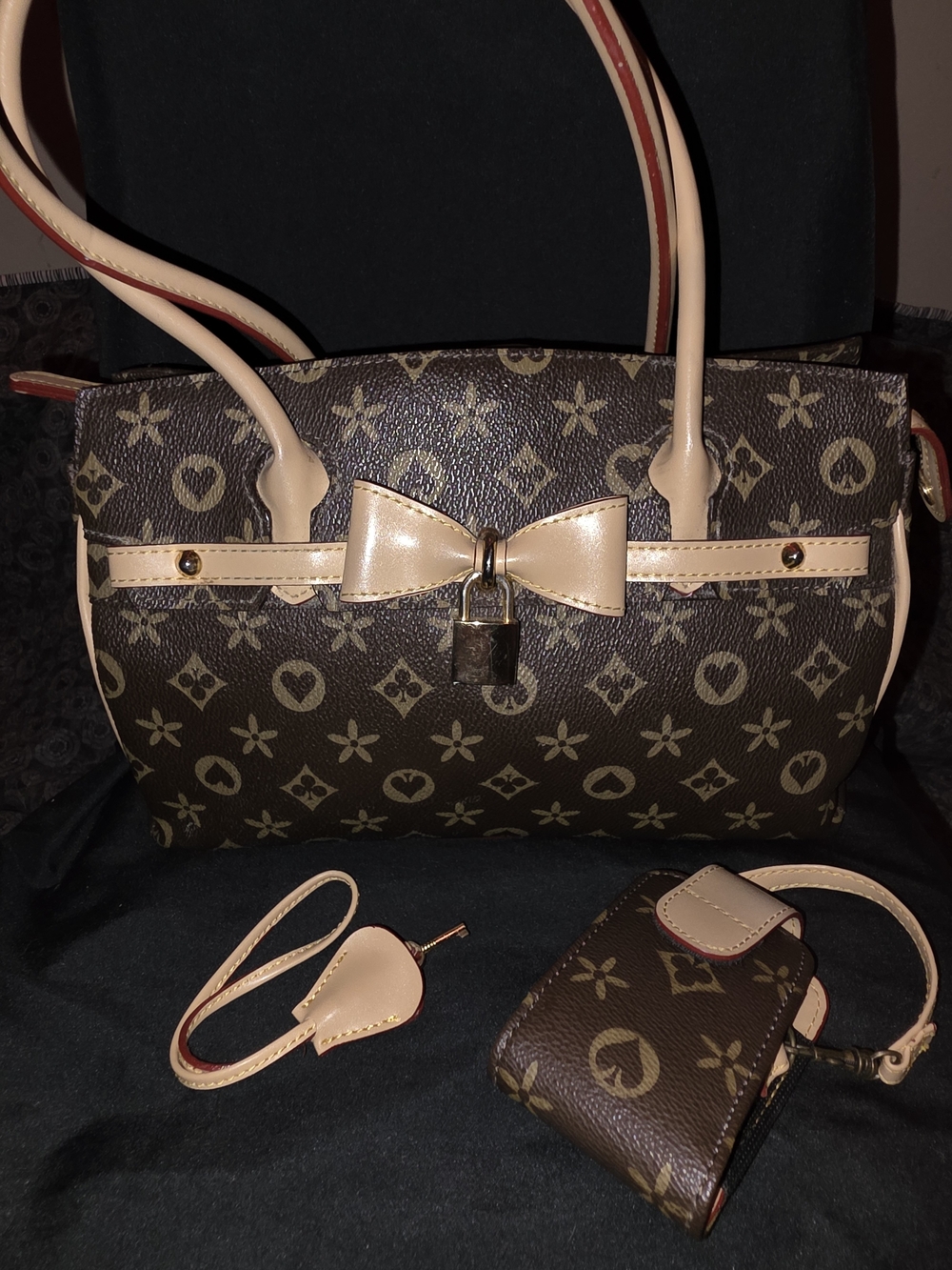 Brown Monogram Tote with Bow and Lock Accent